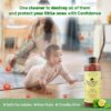 SacredEarth floor wash bottle shown with baby crawling as it with no chemical